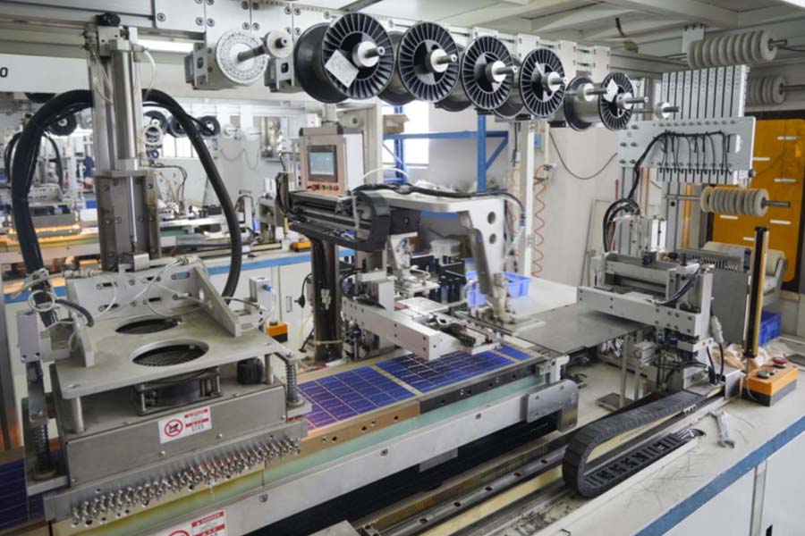 High-precision automated manufacturing equipment for solar light prototyping and reliability validation.