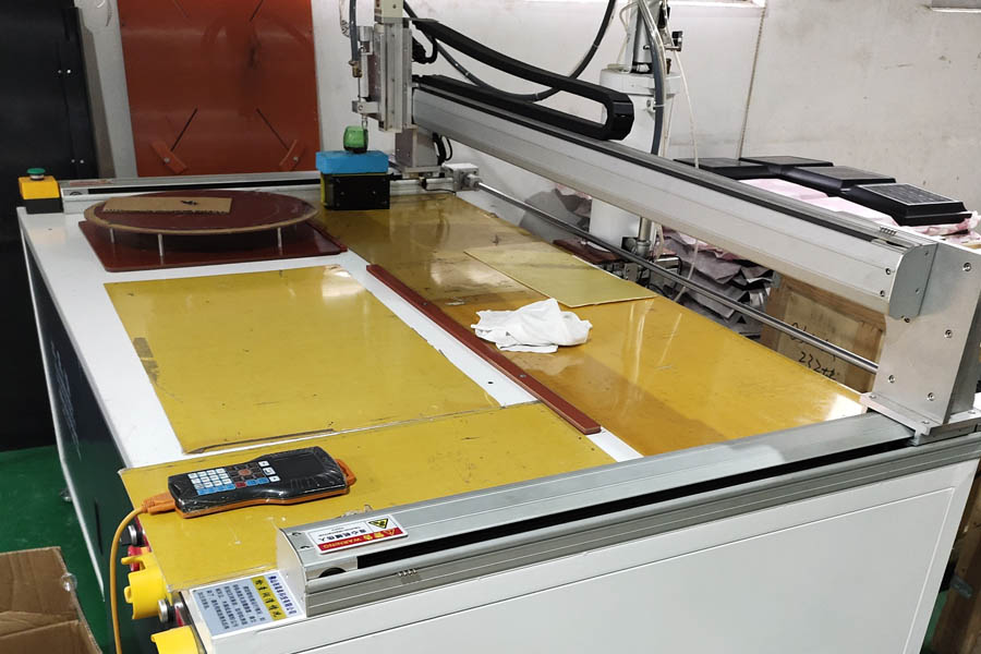 High-precision automatic glue dispensing machine sealing solar lighting housings at Lumin Solar Solutions.